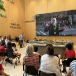 audience listening with a person talking