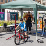 a boy riding a bike