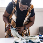 a woman sewing