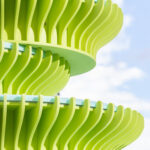 close up to a neon green fountain