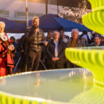 Mark Nixon speaking at a podium