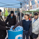 a girl taking a lucky dip