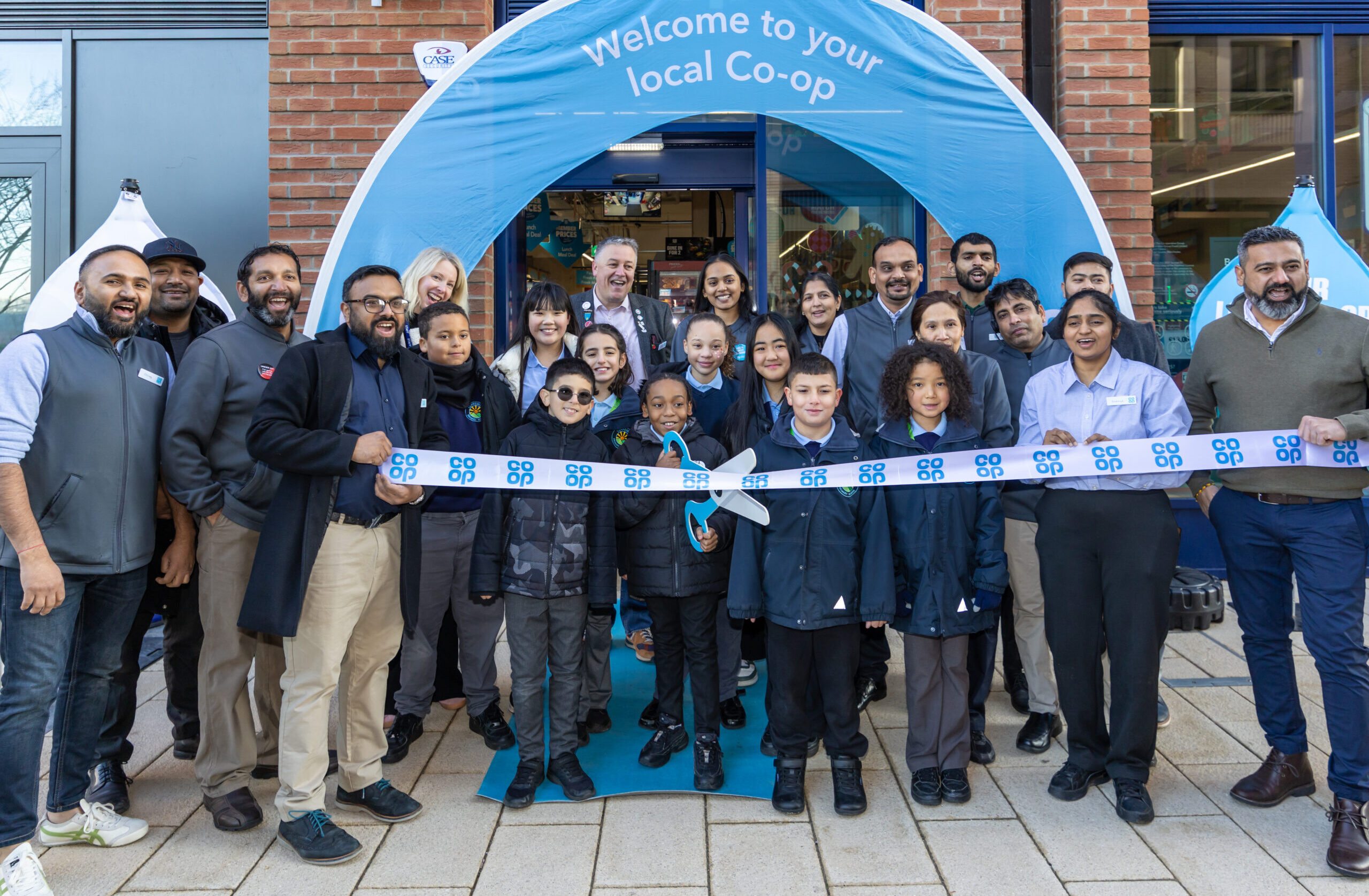 group of people assembled outside a store
