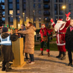 people pushing a button