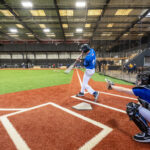 someone batting a ball