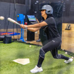 woman holding a bat