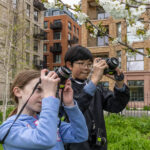 kids holding a camera