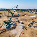 Crane delivering a boulder