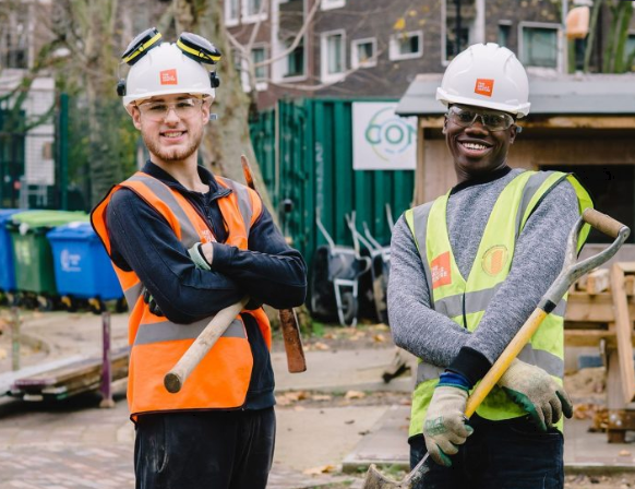 two people wearing PPE
